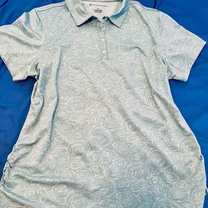 Oxford Golf shirt. Size XL. Light turquoise color with rose print.